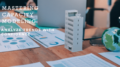 Office desk with documents, laptop, model building, globe, and the text "MASTERING CAPACITY MODELING ANALYZE TRENDS WITH CONFIDENCE